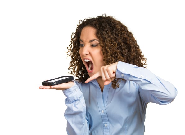 woman yelling at mobile phone