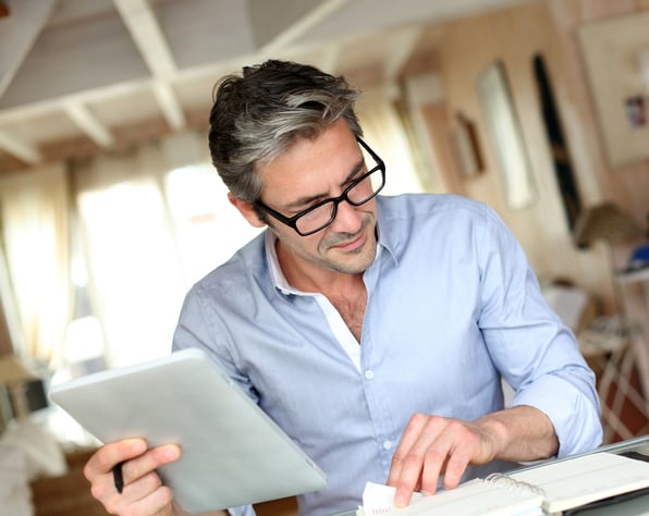 businessman with eyeglasses working from home