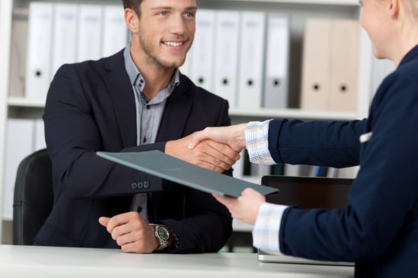 Employer Flexible Talent Review Best Practices Man Shaking Hands with Business Person
